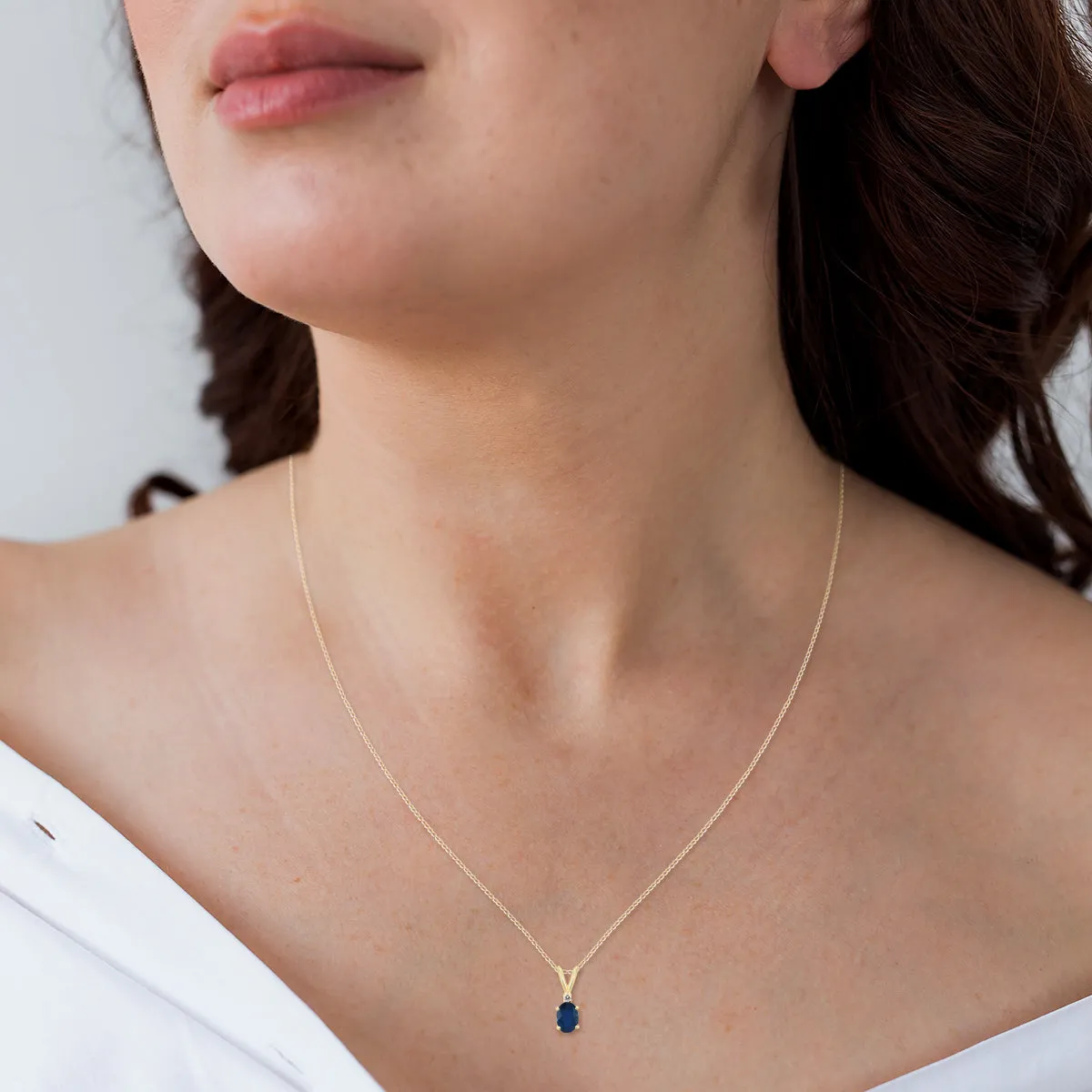 14K Yellow Gold 5X3Mm Oval Sapphire And Diamond Pendant