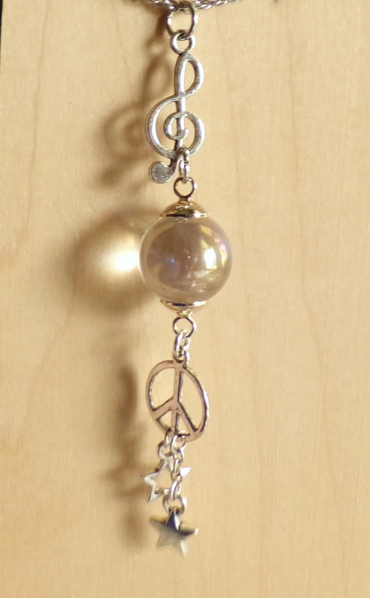Angel Aura Quartz Crystal Ball Musical Peace Necklace