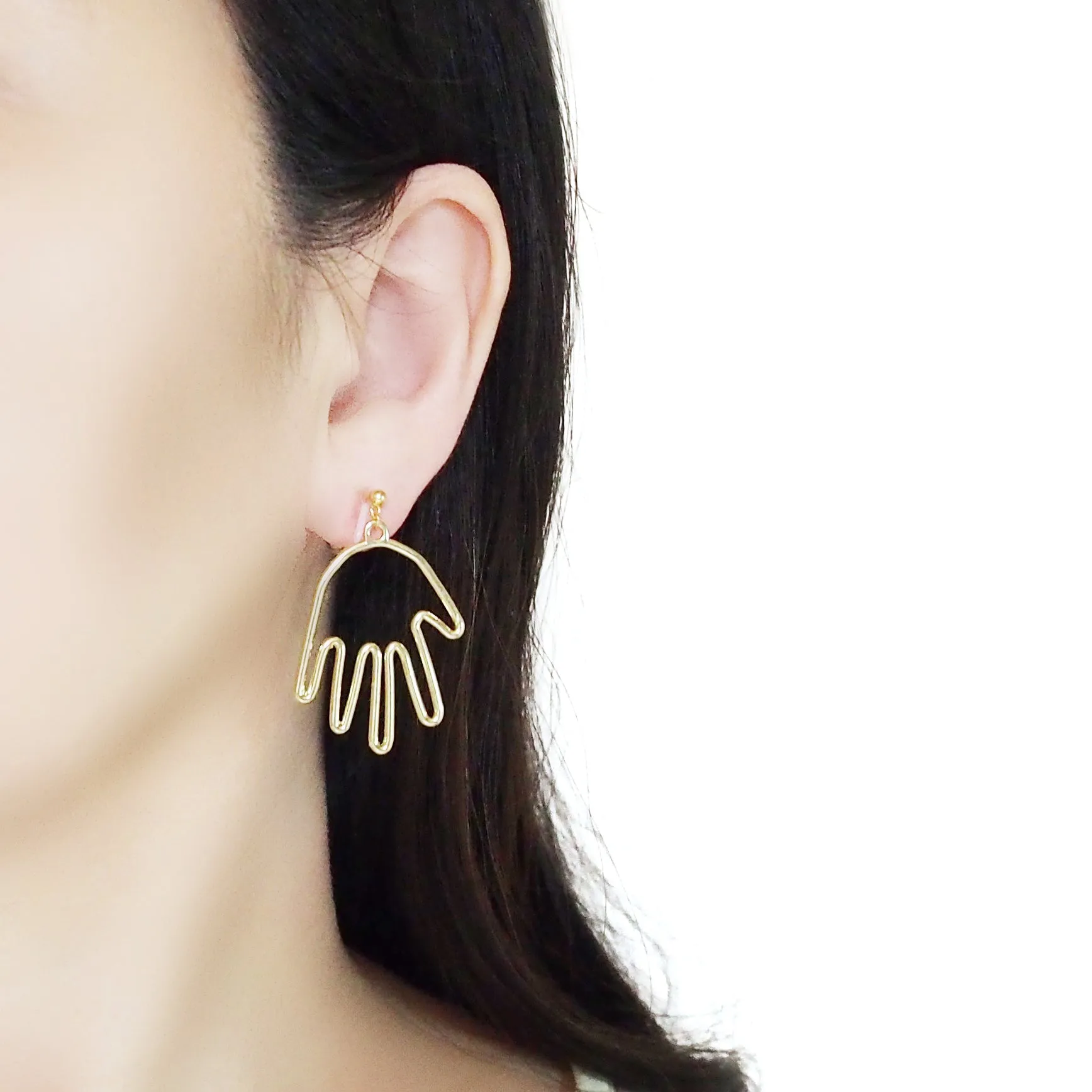 Gold Picasso Hand Invisible Clip On Earrings