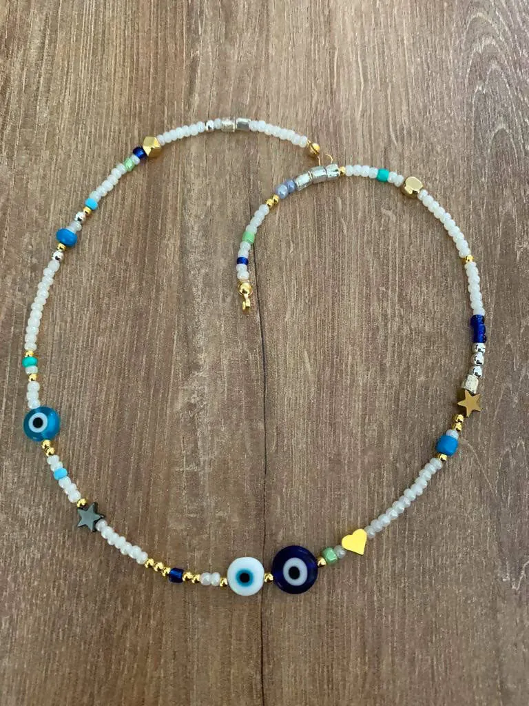 White choker with 3 evil eyes