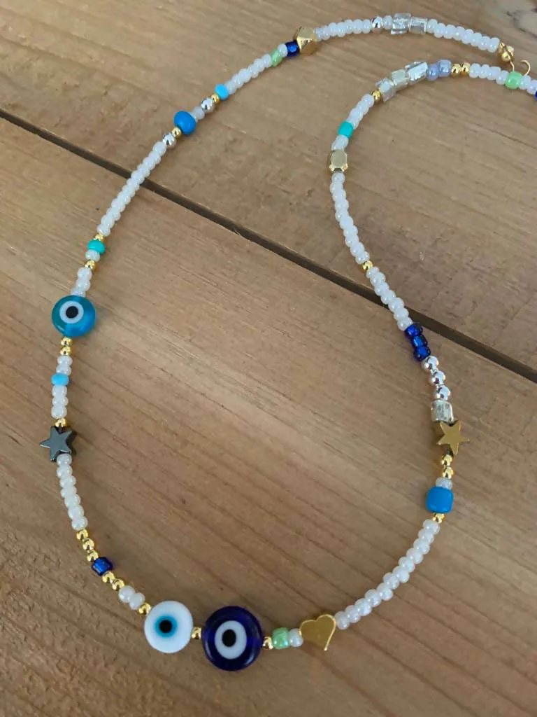 White choker with 3 evil eyes