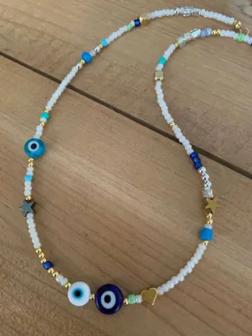 White choker with 3 evil eyes